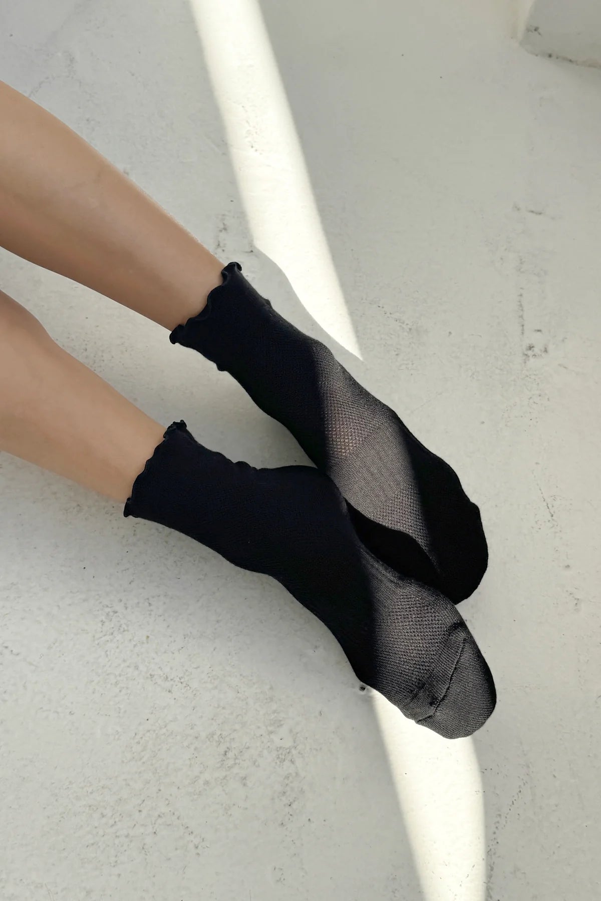 Ruffled hugger black sock